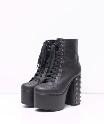 [35] Botas de salto com spikes Reversa