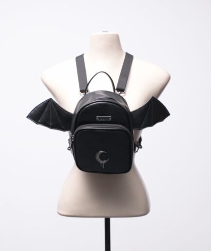 Mini mochila de courino com asas de morcego Reversa